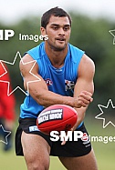 Karmichael Hunt in action during his first official training session for the Gold Coast Football Club at Carrara Stadium.AFL Training , Gold Coast , Queensland ,  Australia . Wednesday 2 June 2010 . Photo: Â© JASON O'BRIEN / SMP IMAGES