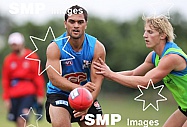 Karmichael Hunt in action during his first official training session for the Gold Coast Football Club at Carrara Stadium.AFL Training , Gold Coast , Queensland ,  Australia . Wednesday 2 June 2010 . Photo: Â© JASON O'BRIEN / SMP IMAGES