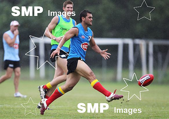 Karmichael Hunt in action during his first official training session for the Gold Coast Football Club at Carrara Stadium.AFL Training , Gold Coast , Queensland ,  Australia . Wednesday 2 June 2010 . Photo: Â© JASON O'BRIEN / SMP IMAGES