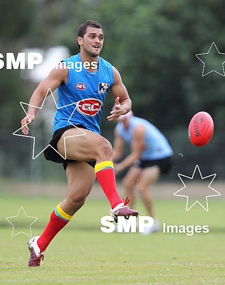 Karmichael Hunt in action during his first official training session for the Gold Coast Football Club at Carrara Stadium.AFL Training , Gold Coast , Queensland ,  Australia . Wednesday 2 June 2010 . Photo: Â© JASON O'BRIEN / SMP IMAGES