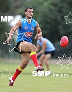 Karmichael Hunt in action during his first official training session for the Gold Coast Football Club at Carrara Stadium.AFL Training , Gold Coast , Queensland ,  Australia . Wednesday 2 June 2010 . Photo: Â© JASON O'BRIEN / SMP IMAGES