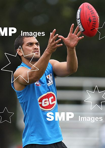 Karmichael Hunt in action during his first official training session for the Gold Coast Football Club at Carrara Stadium.AFL Training , Gold Coast , Queensland ,  Australia . Wednesday 2 June 2010 . Photo: Â© JASON O'BRIEN / SMP IMAGES