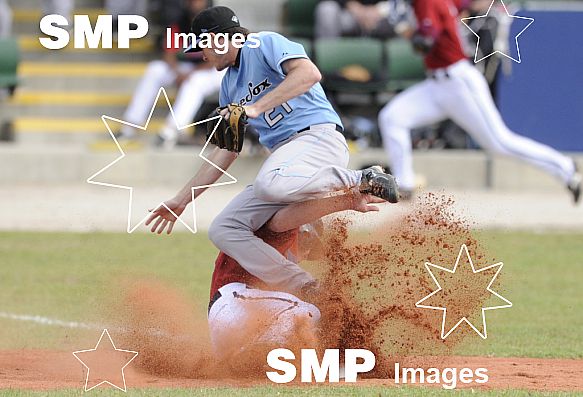 Melbourne Aces Andrew Russell and Sydney Blue Sox Mark Holland, in action during game 1 Round 5 , Melbourne Aces verses Sydney Bluesox.